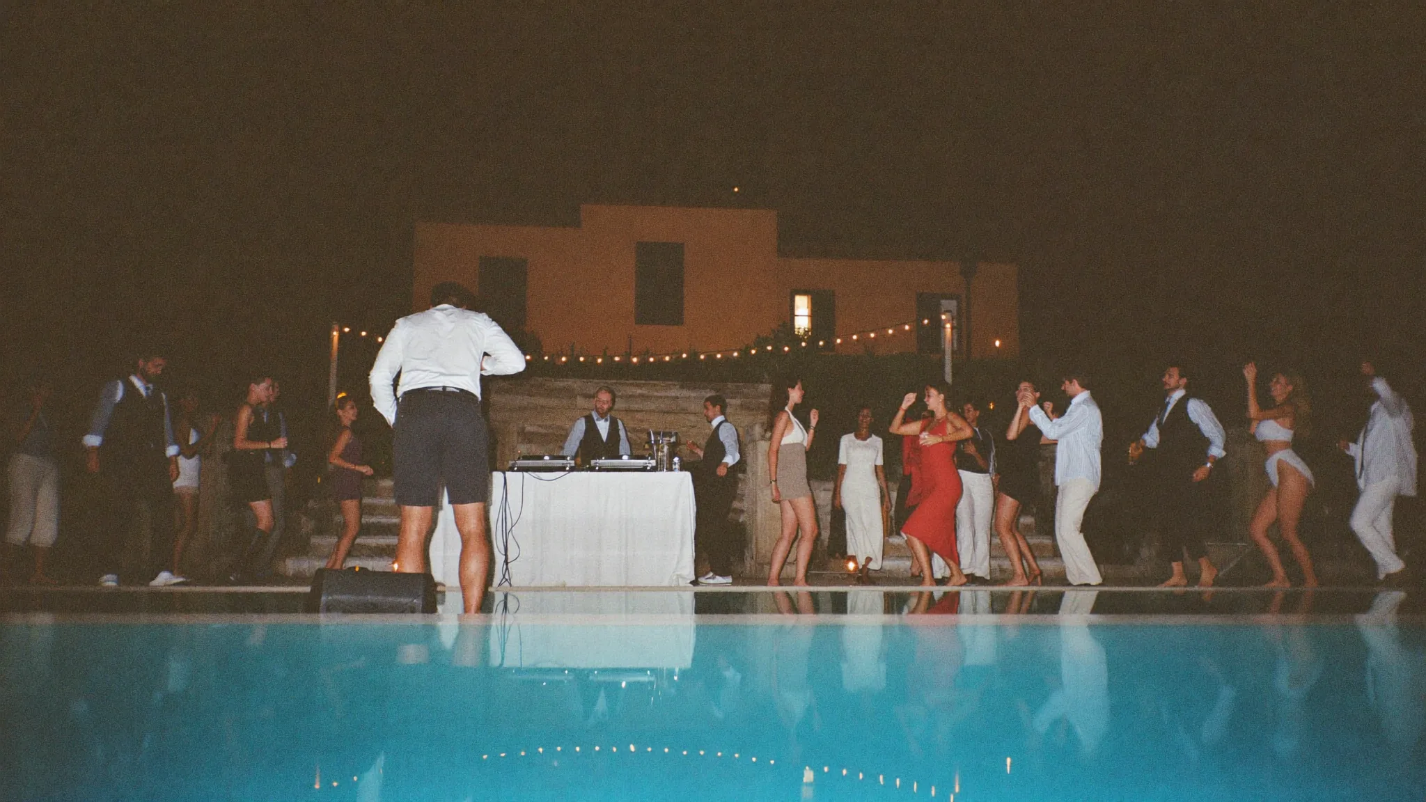 The party, DJ by the pool