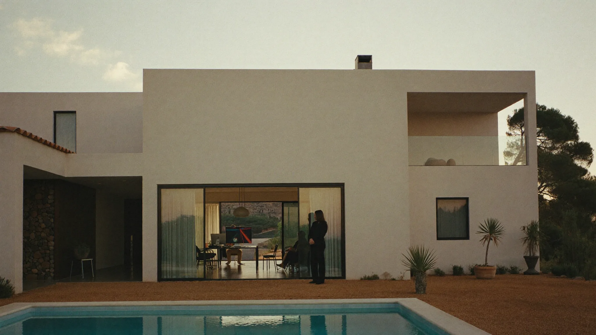 Villa exterior, pool, work session through glass